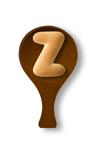 孤立的照片的大写字母饼干Z上的木勺，在白色的背景图片下载