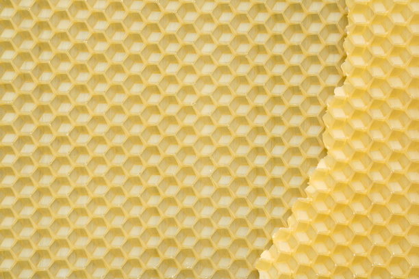 天然蜂蜡纹理。蜂巢的蜜蜂背景。蜂蜡基础，蜜蜂重建。图片下载