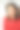 工作室肖像的年轻女子在红色针织毛衣和耳环在白色的背景图片下载