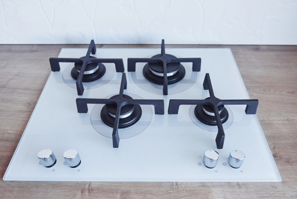 在白天，近墙的煤气炉顶部的近视图图片下载