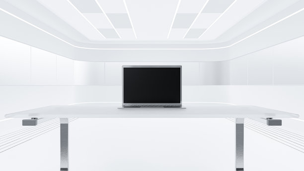 玻璃桌上的笔记本电脑。图片下载