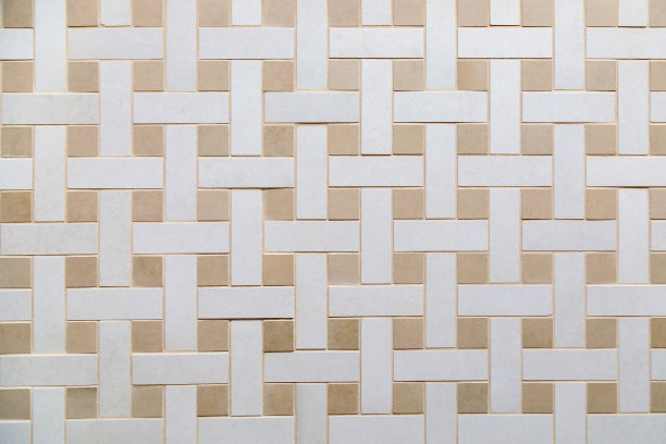 米色瓷砖的纹理具有编织图案。图片下载