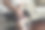 亚洲老年妇女膝部骨关节炎疼痛在家。图片下载