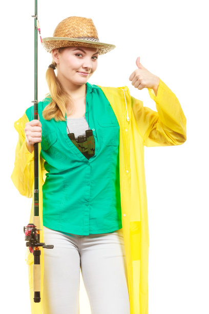 女人拿着钓竿，纺纱设备图片下载