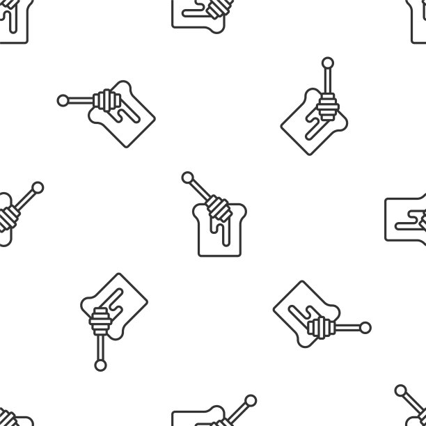 灰线蜂蜜勺沾着滴蜜图片下载