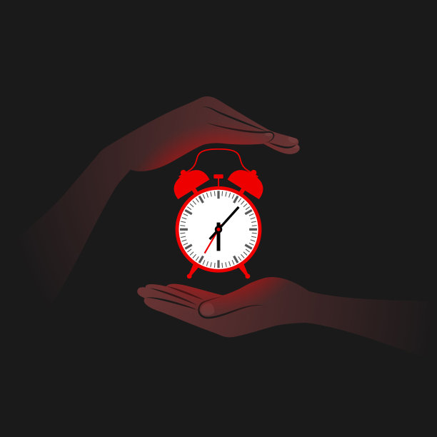 黑暗中红色的闹钟和靠近它的人的手图片下载