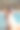 美丽的女人在海滩上抱着卵石与太阳图片图片下载