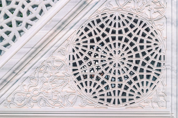 东方风格的雕刻花卉图案的石材大理石墙图片下载