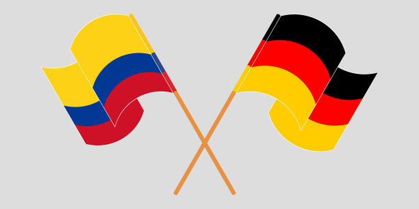 交叉挥舞着哥伦比亚和德国的旗帜图片下载