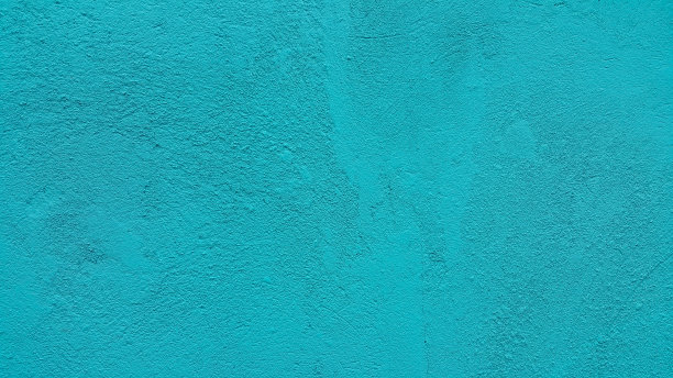 墙壁上绿松石石膏的抽象纹理。混凝土砂浆层。背景图像。复制文本的位置。建筑设计图面。粗糙的壁纸。图片下载