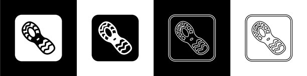 设置人类脚印鞋图标隔离在黑色图片下载