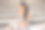 照片中，20多岁的漂亮年轻女子穿着休闲的夏装，坐在城市的楼梯上，一边使用银色笔记本电脑一边喝外卖咖啡图片下载