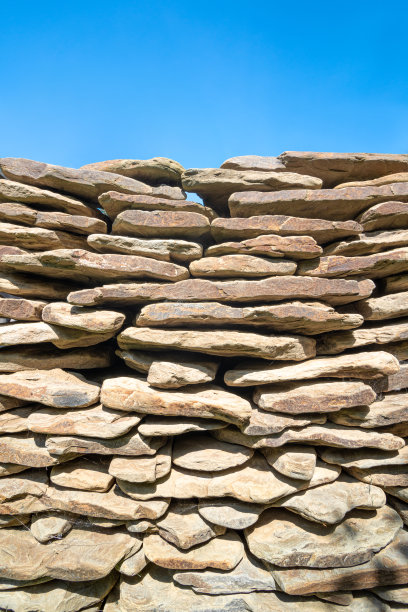 天然铺砌石叠装饰砖蓝天图片下载