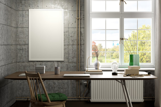 垂直的海报框架模拟在混凝土墙上。图片下载