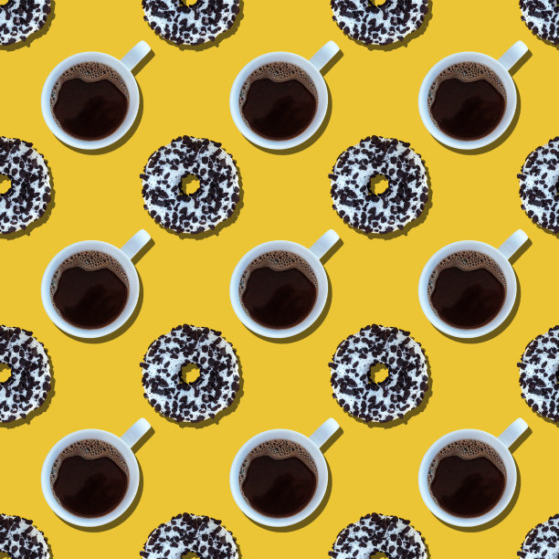 咖啡和甜甜圈图案从上面的黄色背景图片下载