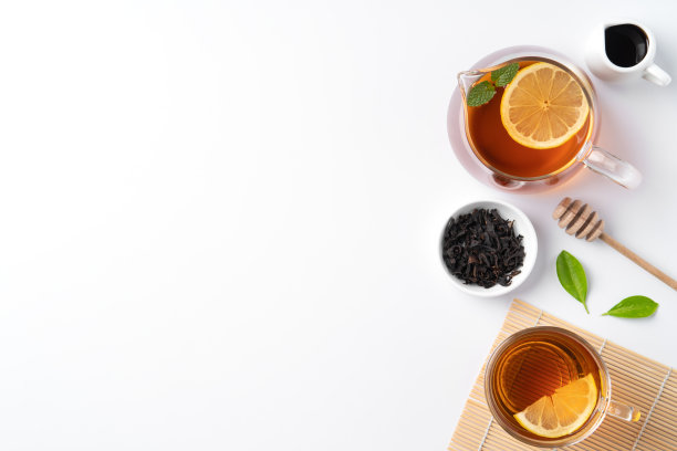 设计理念俯视图蜂蜜红茶与柠檬和薄荷。图片下载