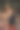 一位身穿深蓝色连衣裙、黑发碧眼的亚洲女子倚在一辆自行车的车把上。出于艺术目的，照片中有一个纹理和一个小的聚焦深度图片下载