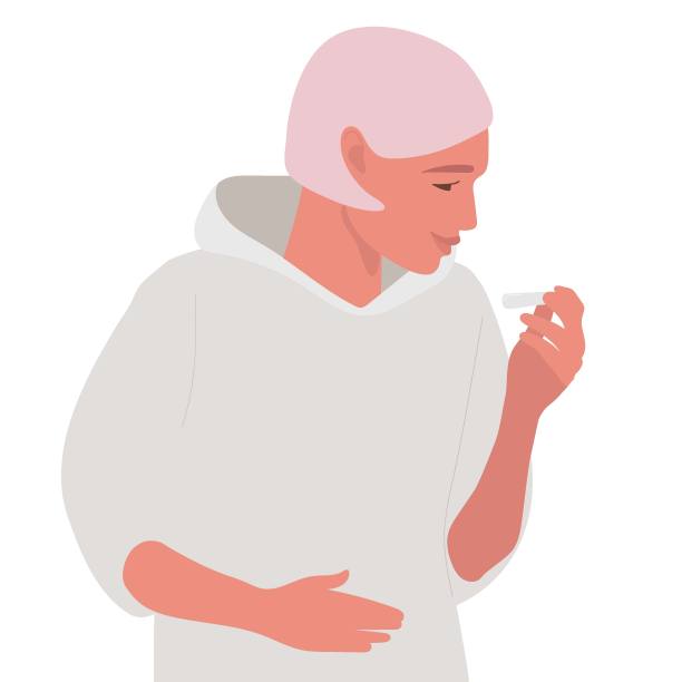 年轻女子在看验孕棒。怀孕测试呈阳性，笑容可掬的女人喜笑洋洋。渴望有孩子。未来孕妇概念平面矢量插图。粉红色头发穿灰色连帽衫的女性图片下载