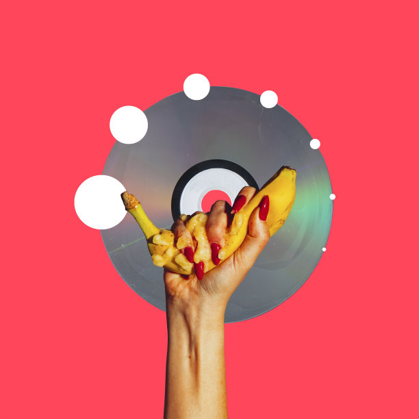 流行艺术风格的现代艺术拼贴画。手用香蕉孤立在红色背景上，与广告文案空间进行对比图片下载