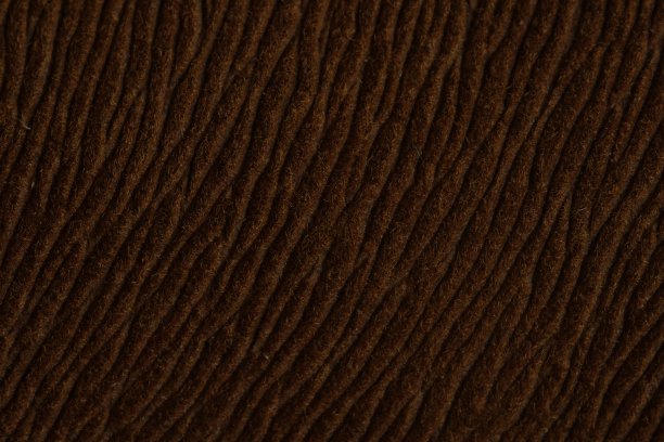 褐色土色的毛色，天然的毛皮花纹纹理背景。图片下载
