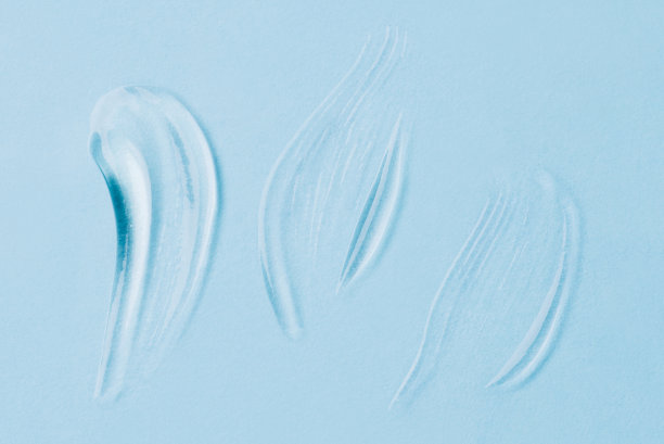 蓝色背景上的凝胶涂片。图片下载