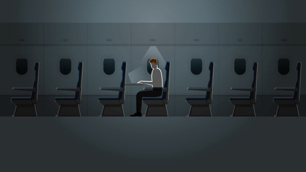 在飞机客舱里，一个人在昏暗的小灯光下用笔记本电脑工作。出差、加班、过度工作的生活方式。飞机内部有一个空座位。图片下载