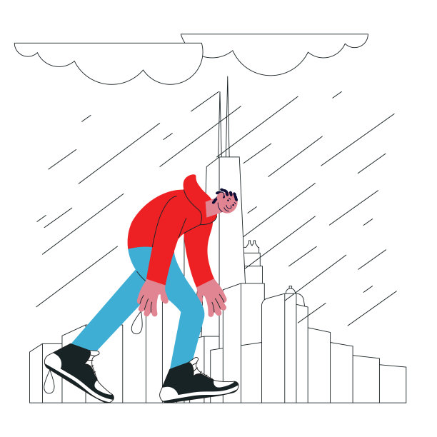 一个黑人年轻人穿过暴风雨穿过城市图片下载