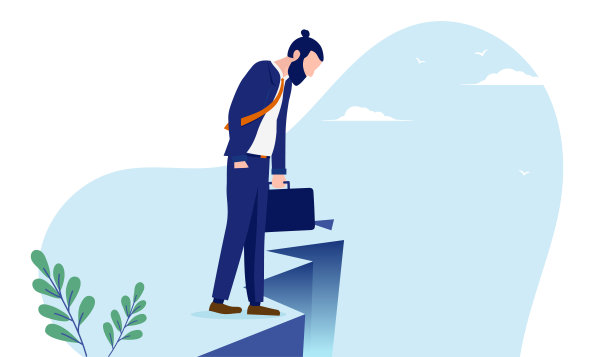 逆境中的商人——站在悬崖边向下看的人图片下载