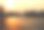 泰国的乡村公路上行驶的汽车和美丽的金色夕阳背景。图片下载