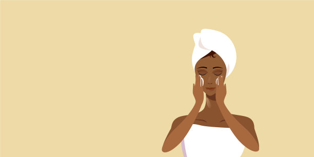 年轻女子涂抹面霜非洲裔美国人图片下载