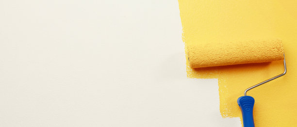 粉刷公寓，装修用黄色油漆。图片下载