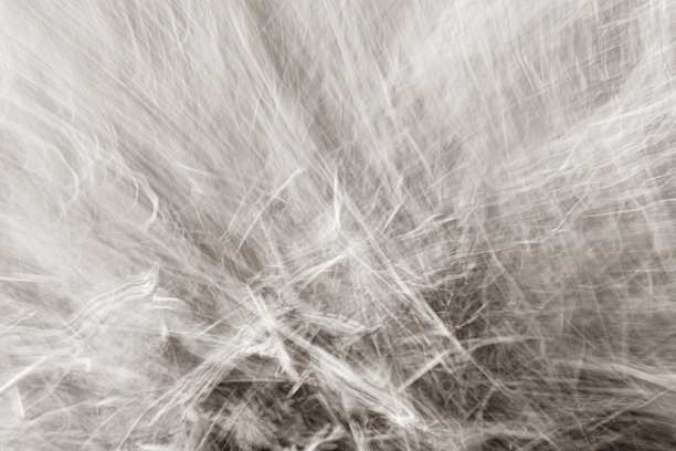 抽象的灰米色背景，蜘蛛网，曲线和高光。照片的效果。图片下载