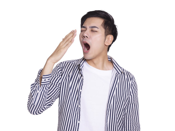 年轻帅哥打呵欠，觉得累了图片下载
