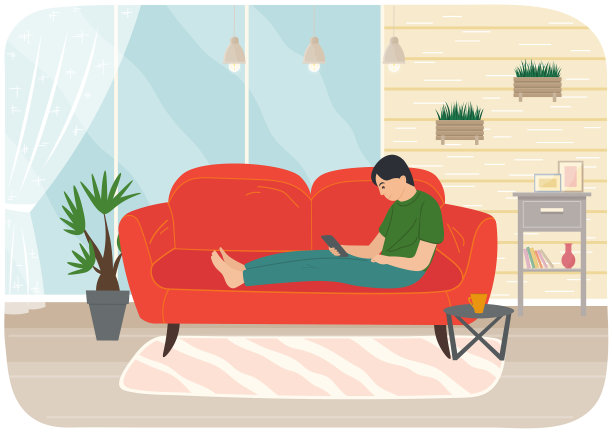 年轻人坐在沙发上用平板电脑学习图片下载