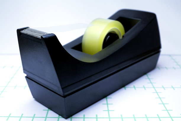 复古胶带分配器在黑色白色背景办公配件大提琴分配器图片下载