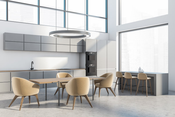 明亮的厨房内部，家具放在靠近窗户的混凝土地板上图片下载