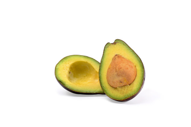 一半鳄梨孤立在白色背景上。健康水果的概念。图片下载