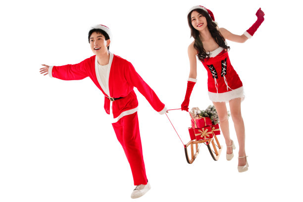 拉着圣诞礼物的年轻情侣图片下载