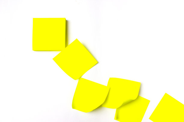 一个黄色空白贴纸的特写背景图片下载