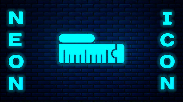 发光的霓虹灯卷尺图标隔离在砖块上图片下载