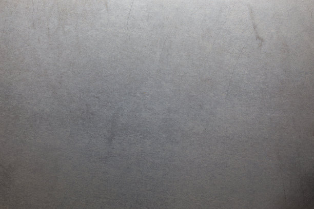 无涂层的冷轧扁钢板表面少有轻微划痕。特写直接在上面组成。图片下载