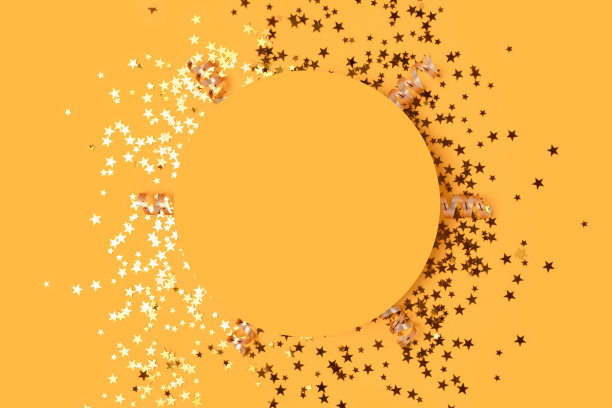 金色五彩纸屑做成的圆形框架。图片下载