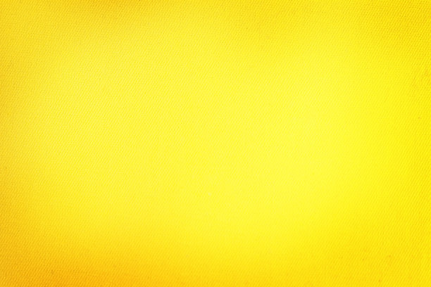 黄色面料背景。图片下载