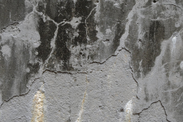 这是一面表面有裂缝的旧混凝土墙的纹理。图片下载
