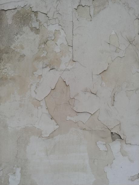 砖墙上剥落的白色油漆图片下载