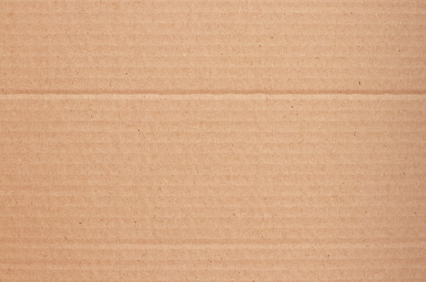 棕色硬纸板抽象背景，纹理回收纸盒在旧的复古模式设计艺术作品。图片下载