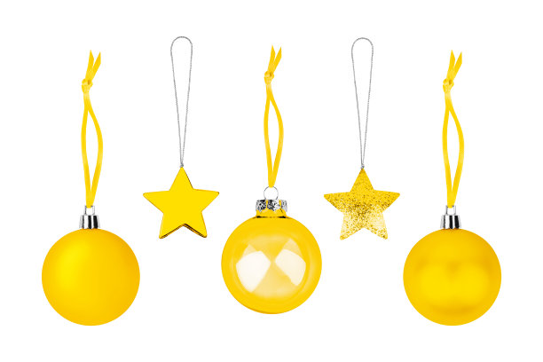 黄色Сhristmas树装饰设置白色背景孤立特写，金色悬挂玻璃球星星，闪亮的黄金小玩意，传统新年假日装饰，设计元素，圣诞玩具装饰图片下载
