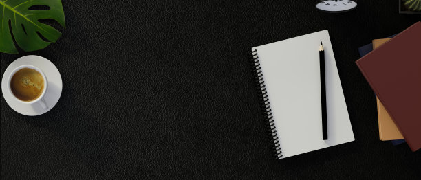 黑暗的现代工作空间，空白的笔记本和办公用品图片下载