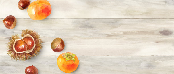 秋季食材:一张鸟瞰图的栗子和柿子滚动在桌子上。横幅背景。图片下载