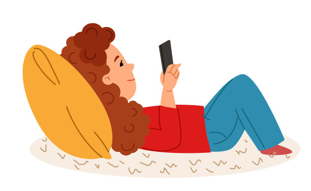 微笑的小女孩躺在枕头上玩她图片下载